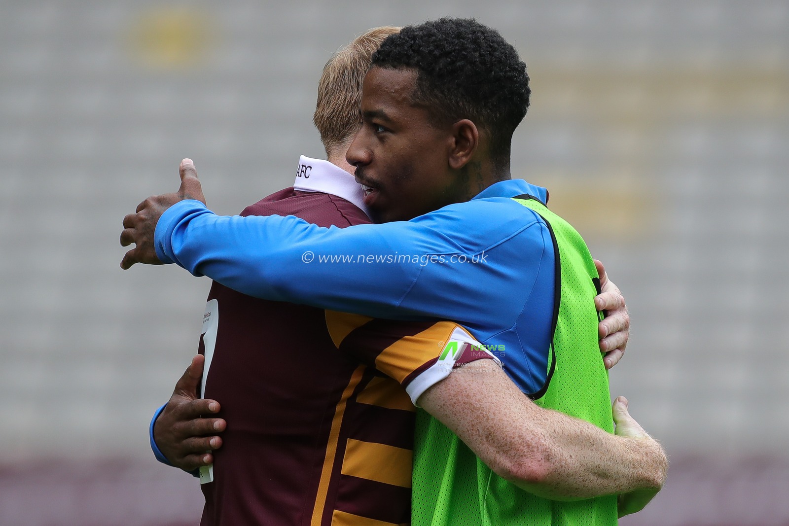 Jason Lokilo of Hull City hugs a Bradford City player during the pre match warm up ahead of the Pre-season friendly match Bradford City vs Hull City at University of Bradford Stadium, Bradford, United Kingdom, 22nd July 2023

(Photo by James Heaton/News Images)