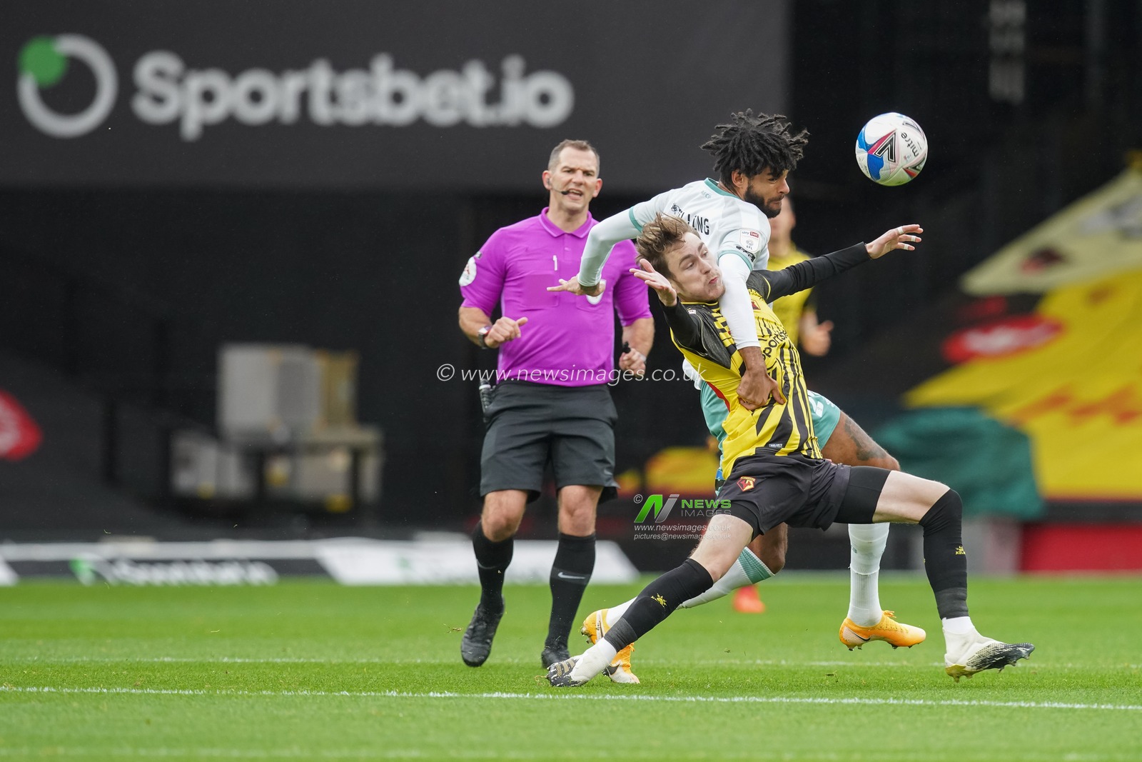 James Garner (16) of Watford battles for the ball with Philip Billing (29) of Bournemouth