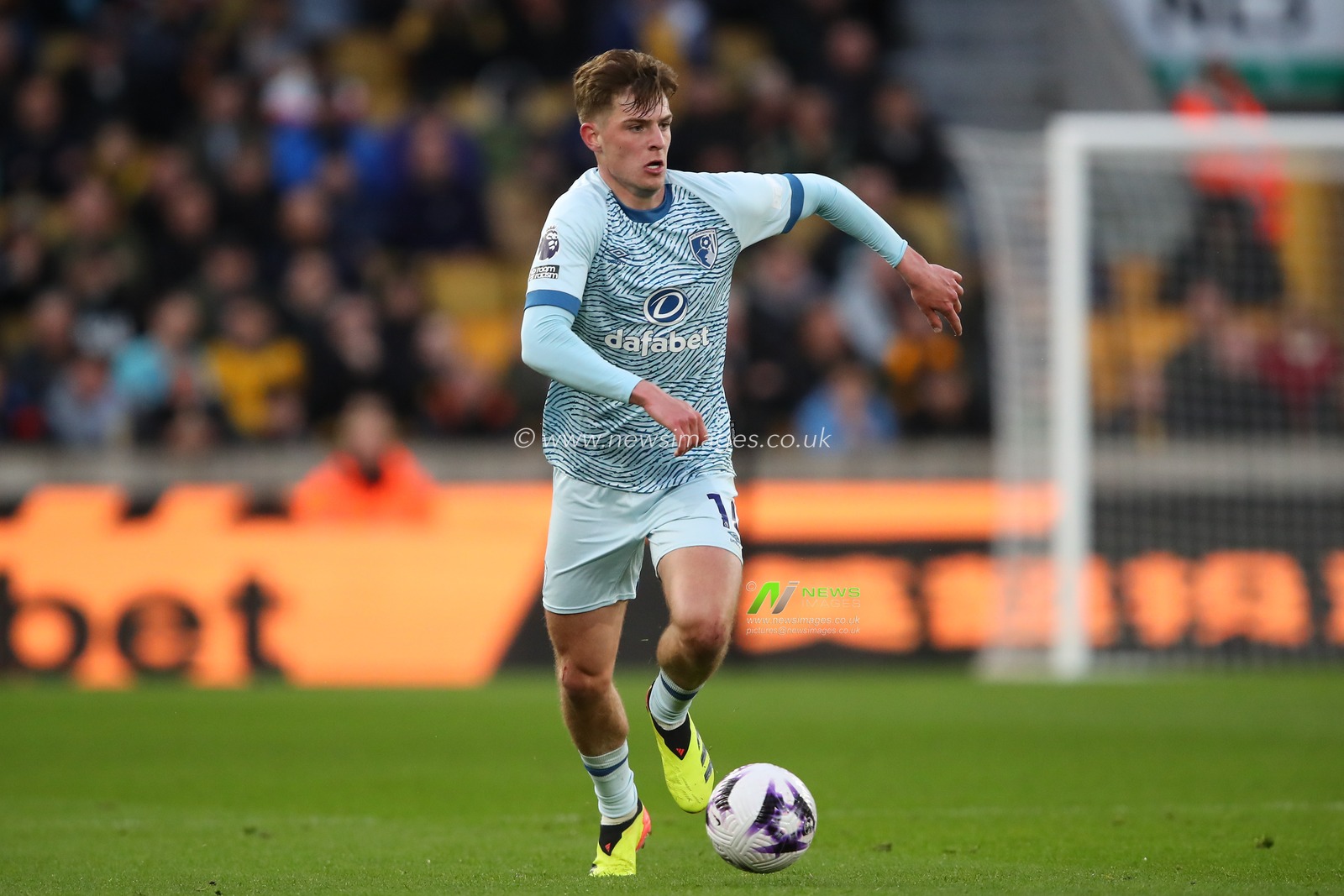 Alex Scott of Bournemouth breaks with the ball during the Premier League match Wolverhampton Wanderers vs Bournemouth at Molineux, Wolverhampton, United Kingdom, 24th April 2024

(Photo by Gareth Evans/News Images)