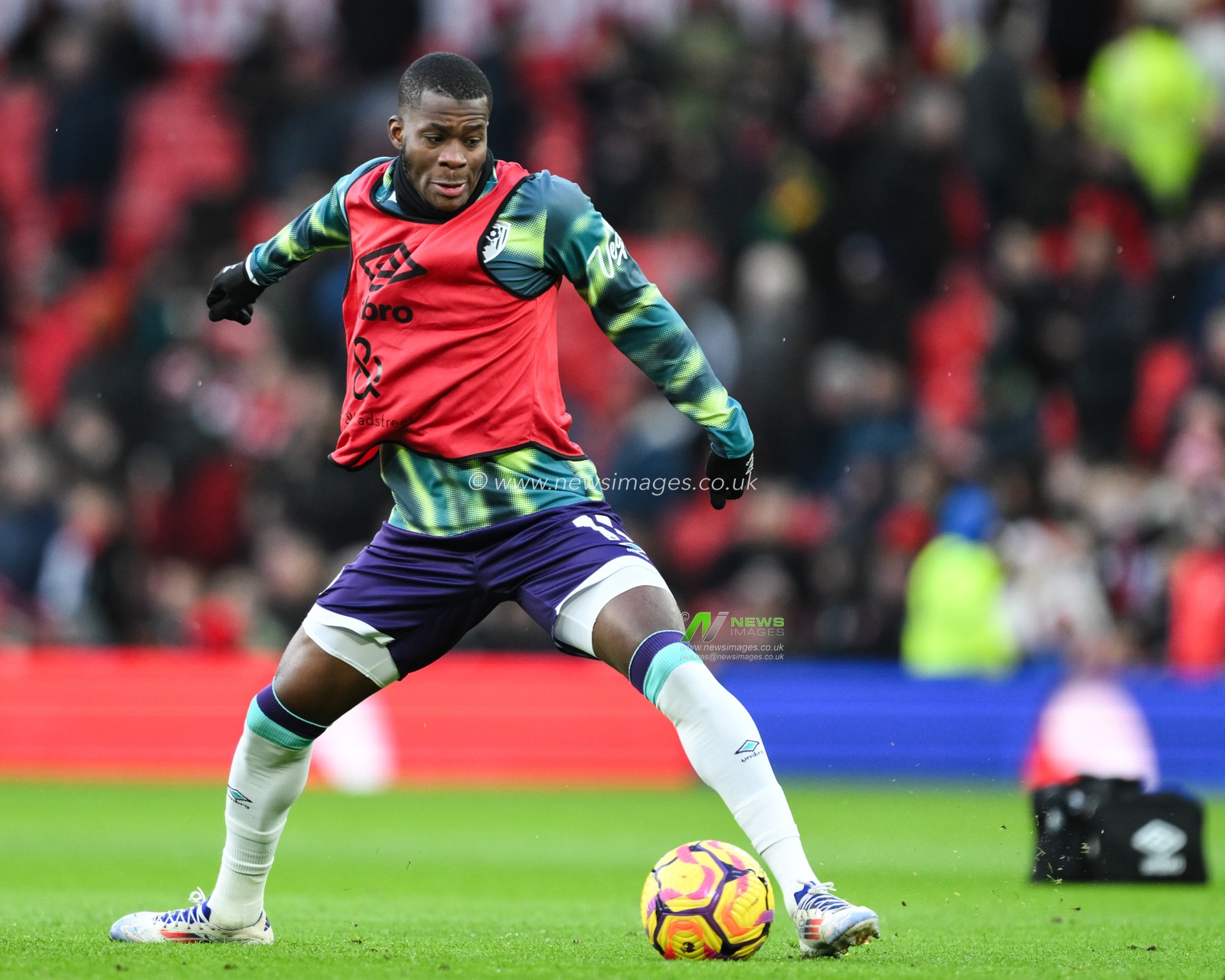 Dango Ouattara of Bournemouth during the pre-game warm up ahead of the Premier League match Manchester United vs Bournemouth at Old Trafford, Manchester, United Kingdom, 22nd December 2024

(Photo by Craig Thomas/News Images)