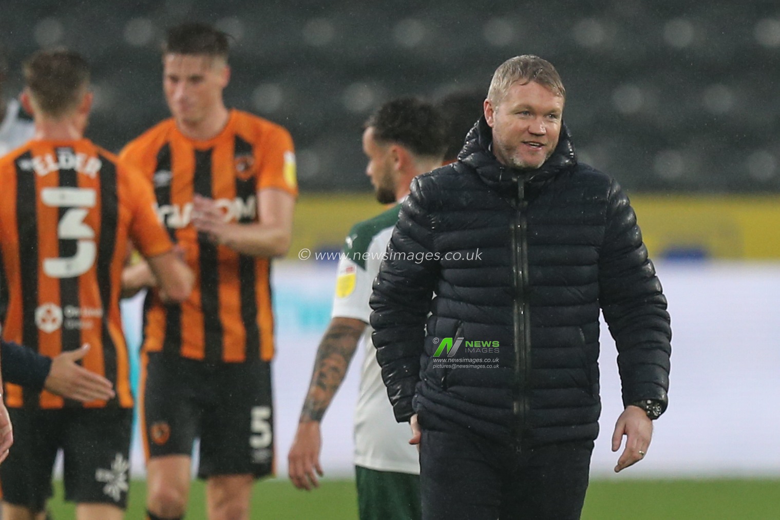 Grant McCann manager of Hull City smiling at the end of the match