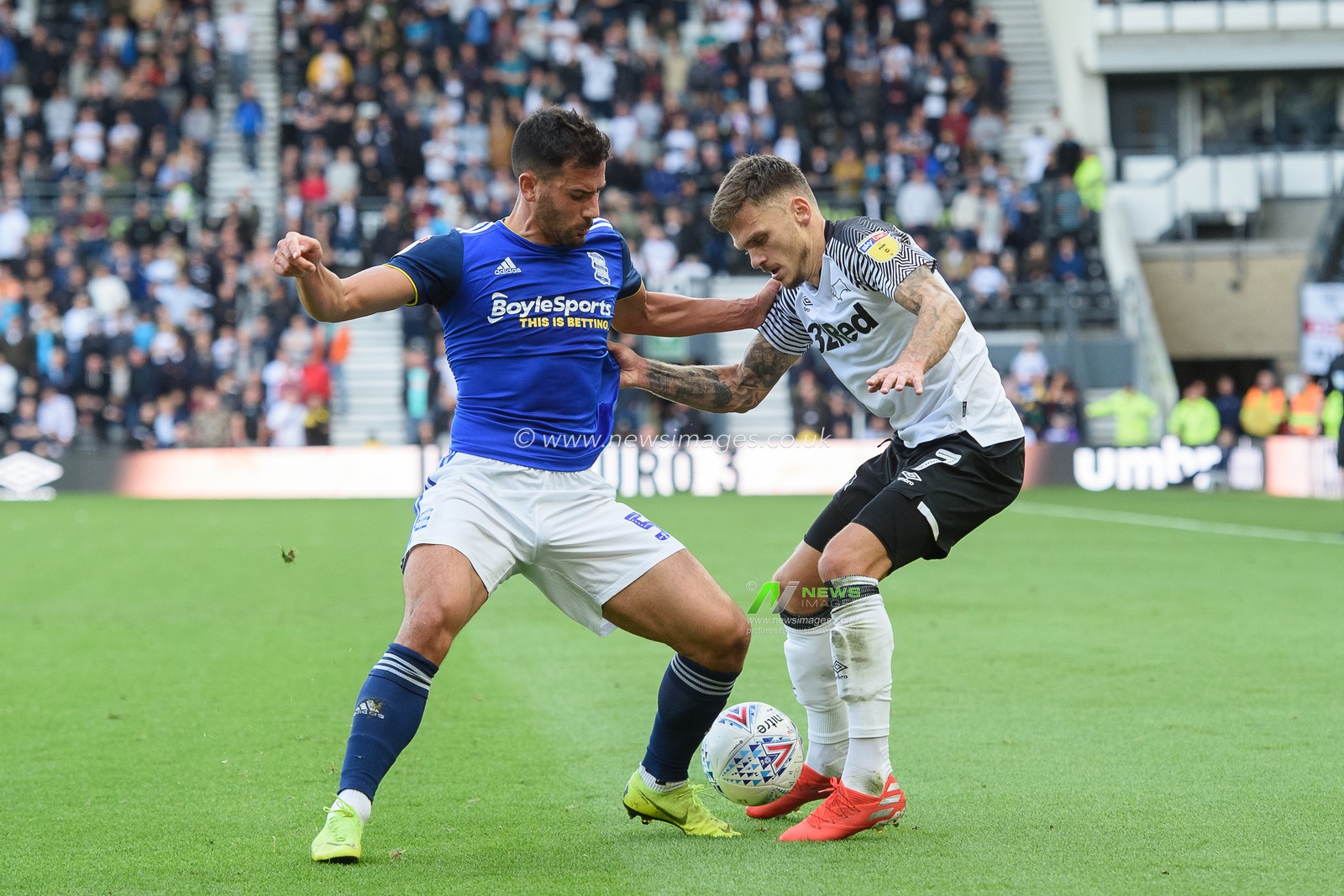 28th September 2019, Pride Park Stadium, Derby, England; Sky Bet Championship, Derby County v Birmingham City : Maxime Colin (5) of Birmingham City battles with Jamie Paterson (7) of Derby County 

Credit: Jon Hobley/News Images