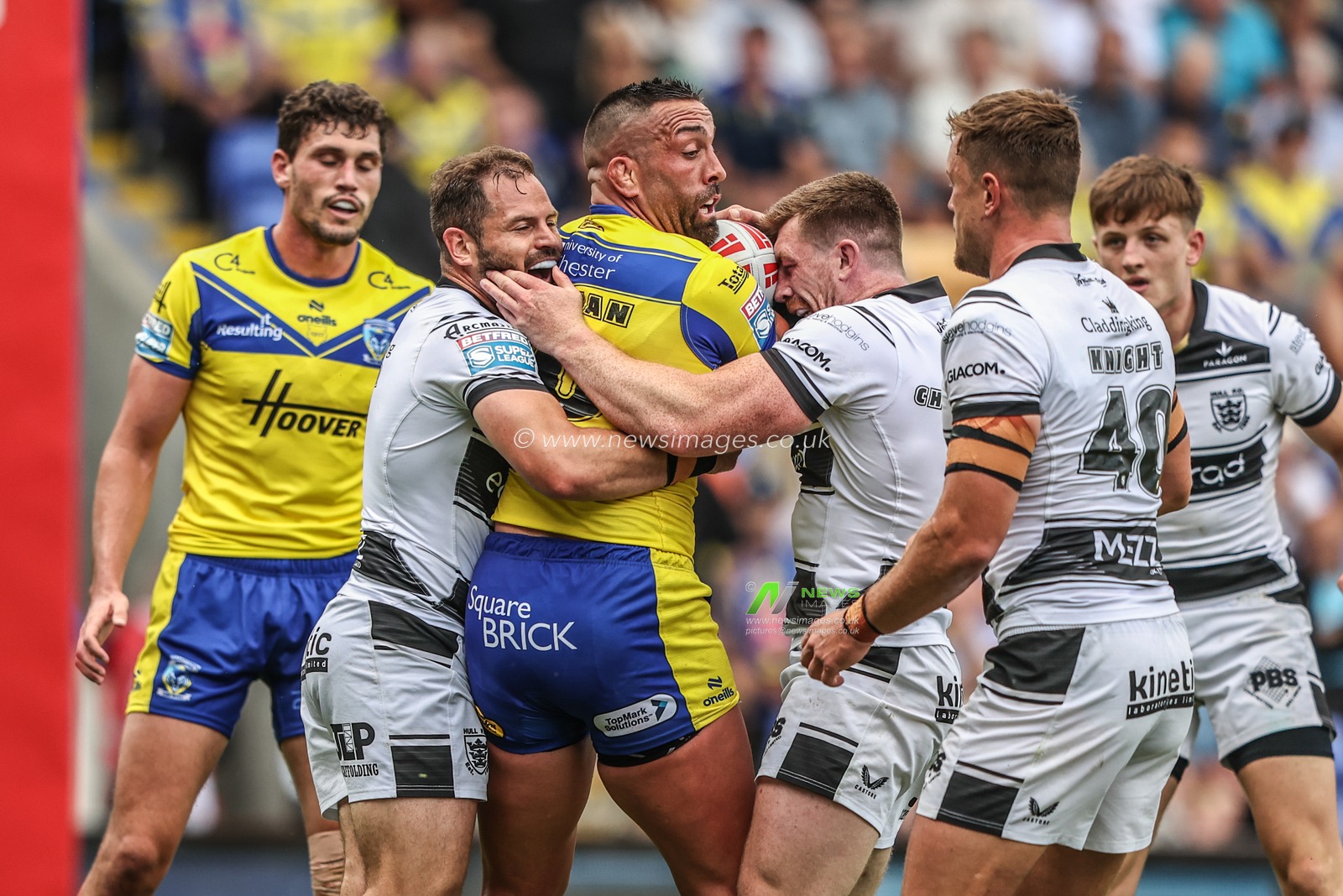 , Paul Vaughan is tackled during the Betfred Super League round 16 match Warrington Wolves vs Hull FC at Halliwell Jones Stadium, Warrington, United Kingdom, 28th June 2025

(Photo by Alfie Cosgrove/News Images)