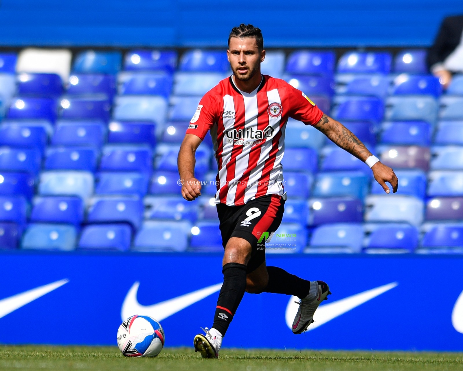 Emiliano Marcondes (9) of Brentford runs with the ball