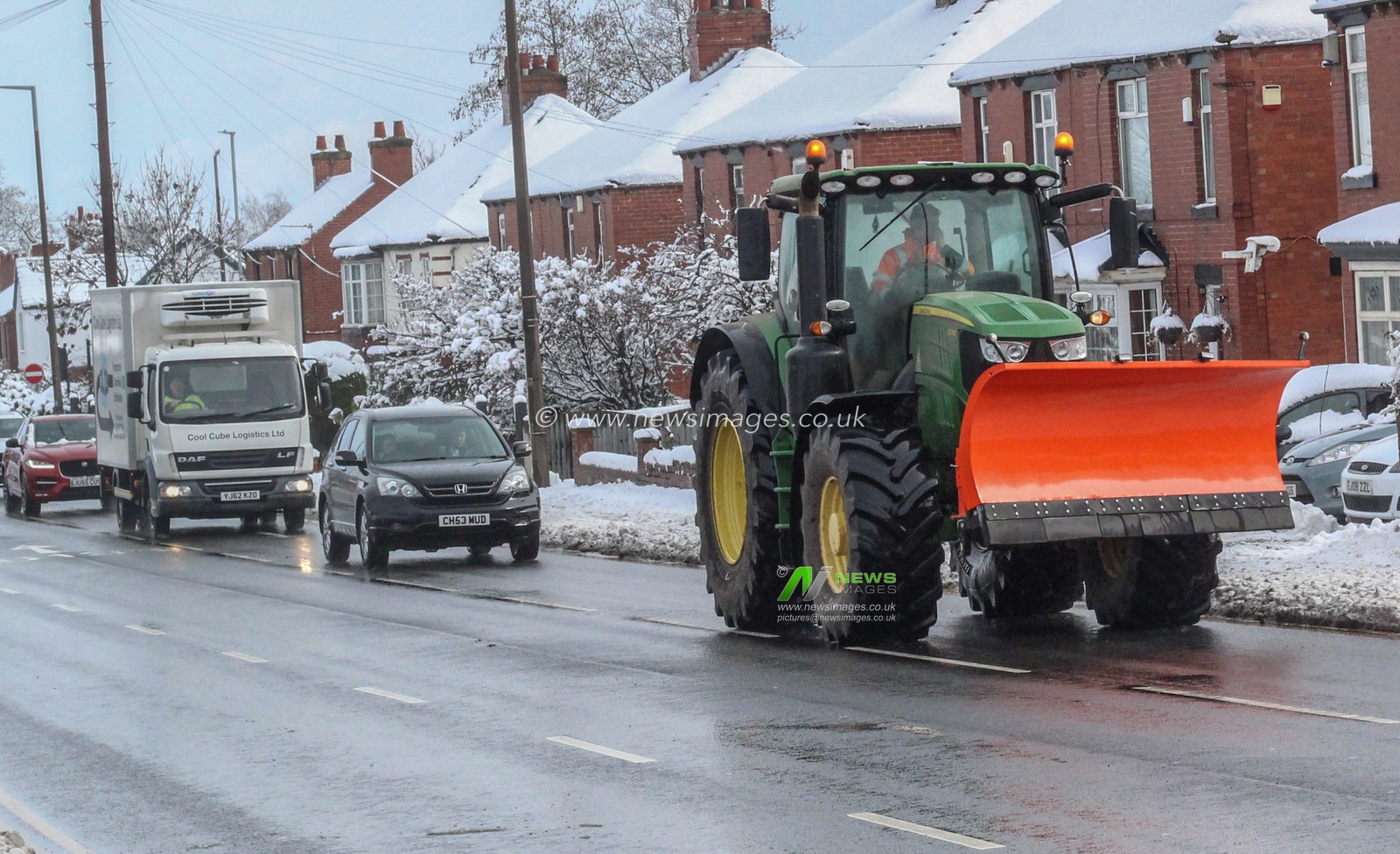 A tractor snowplow is out on the roads as heavy snow hits Barnsley as Yellow warning of snow is enforce in the Yorkshire area; Barnsley,  South Yorkshire, United Kingdom, 10th March 2023

(Photo by Alfie Cosgrove/News Images)