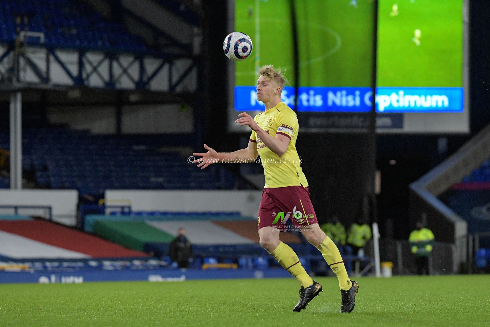Ben Mee #6 of Burnley heads the ball