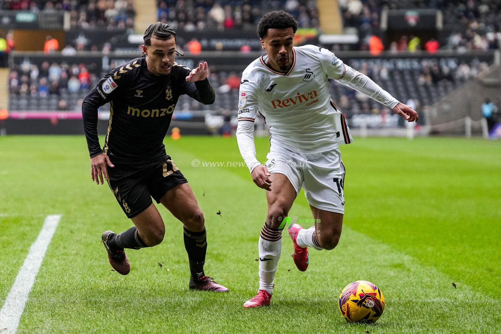 Florian Bianchini of Swansea City under pressure from Joel Latibeaudiere of Coventry City during the Sky Bet Championship match Swansea City vs Coventry City at Swansea.com Stadium, Swansea, United Kingdom, 1st February 2025

(Photo by Andrew Lewis/News Images)