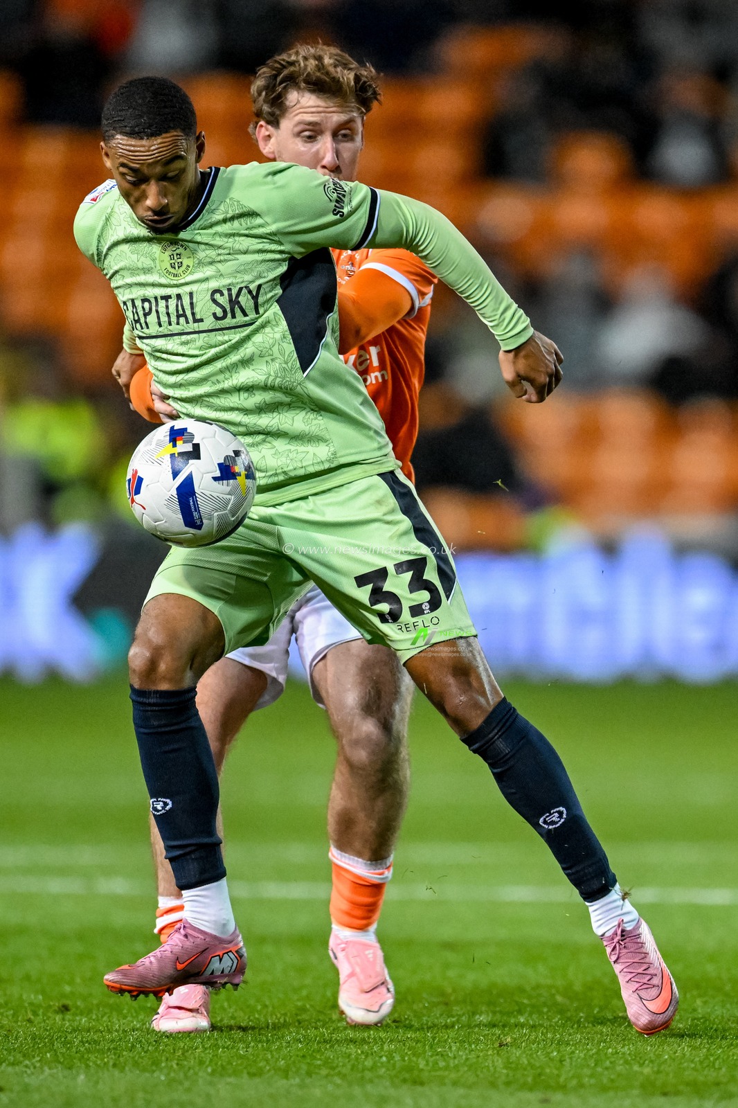 Cohen Bramall of Luton Town  gets the better of /b19. to win the ball during the Sky Bet League 1 match Blackpool vs Luton Town at Bloomfield Road, Blackpool, United Kingdom, 30th September 2025

(Photo by Adam Gee/News Images)