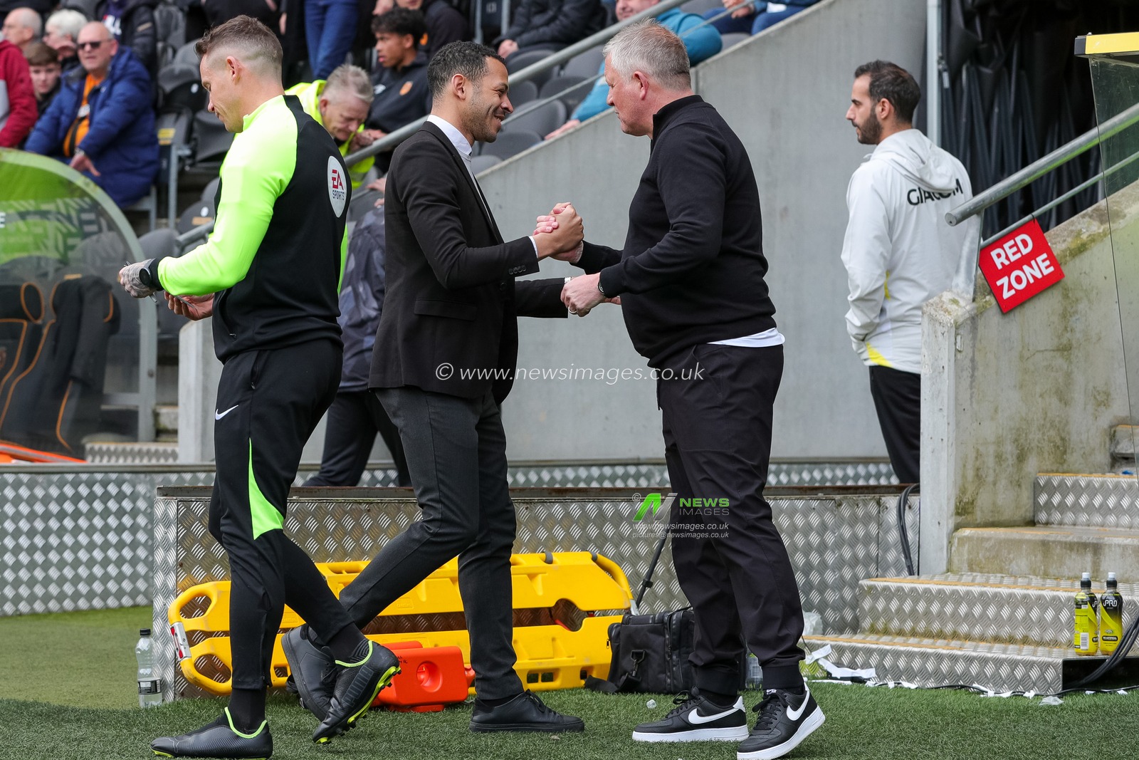 Liam Rosenior manager of Hull City meets with Chris Wilder manager of Watford right before kick off during the Sky Bet Championship match Hull City vs Watford at MKM Stadium, Hull, United Kingdom, 22nd April 2023

(Photo by James Heaton/News Images)