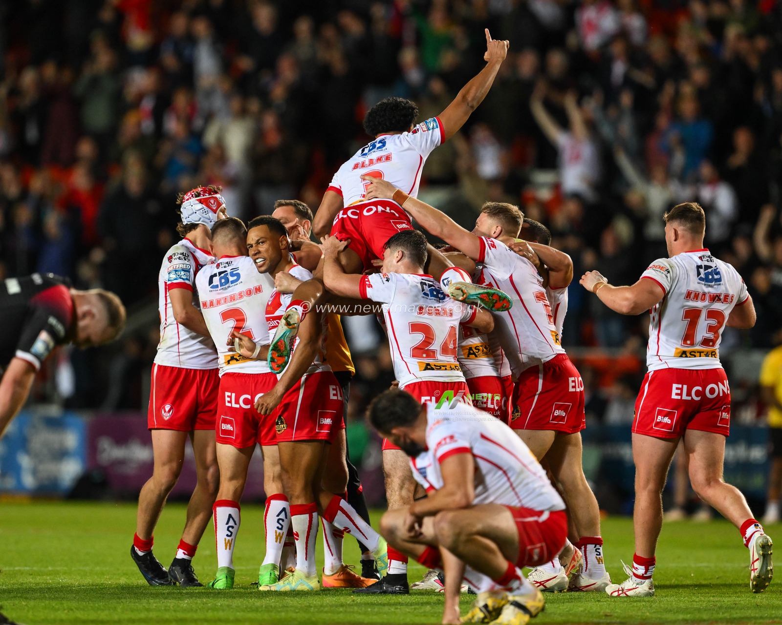 Moses Mbye of St. Helens celebrates his drop goal in extra time to win Betfred Super League Round 21 match St Helens vs Salford Red Devils at Totally Wicked Stadium, St Helens, United Kingdom, 8th August 2024

(Photo by Craig Thomas/News Images)