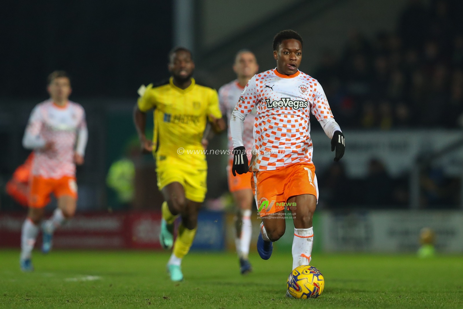 Karamoko DembÃ©lÃ© #11 of Blackpool breaks with the ball during the Sky Bet League 1 match Burton Albion vs Blackpool at Pirelli Stadium, Burton upon Trent, United Kingdom, 26th December 2023

(Photo by Gareth Evans/News Images)