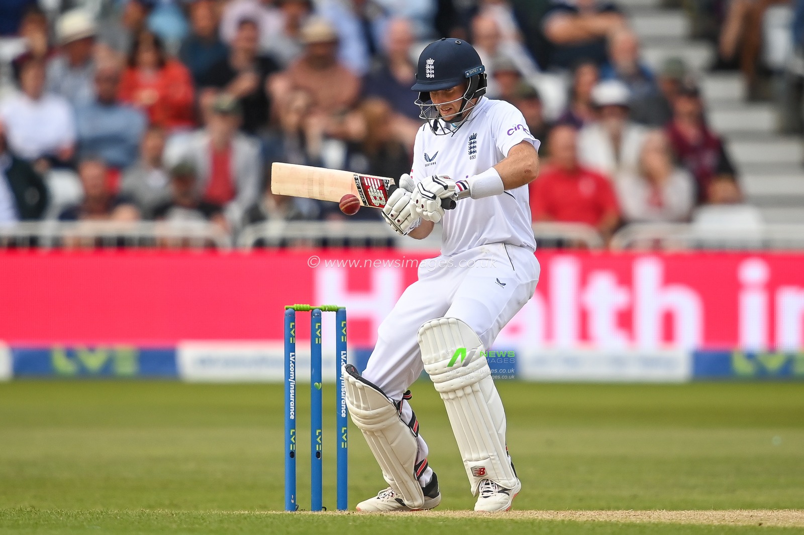 Joe Root of England cuts the ball