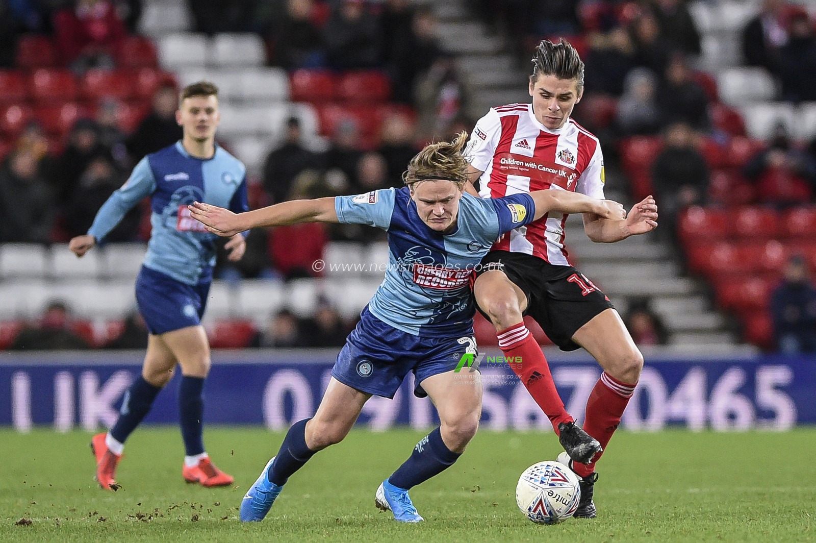 11th January 2020, Stadium Of Light, Sunderland, England; Sky Bet League 1, Sunderland v Wycombe Wanderers : Alex Samuel (25) of Wycombe Wanderers battles for possession with George Dobson (18) of Sunderland

Credit: Iam Burn/News Images