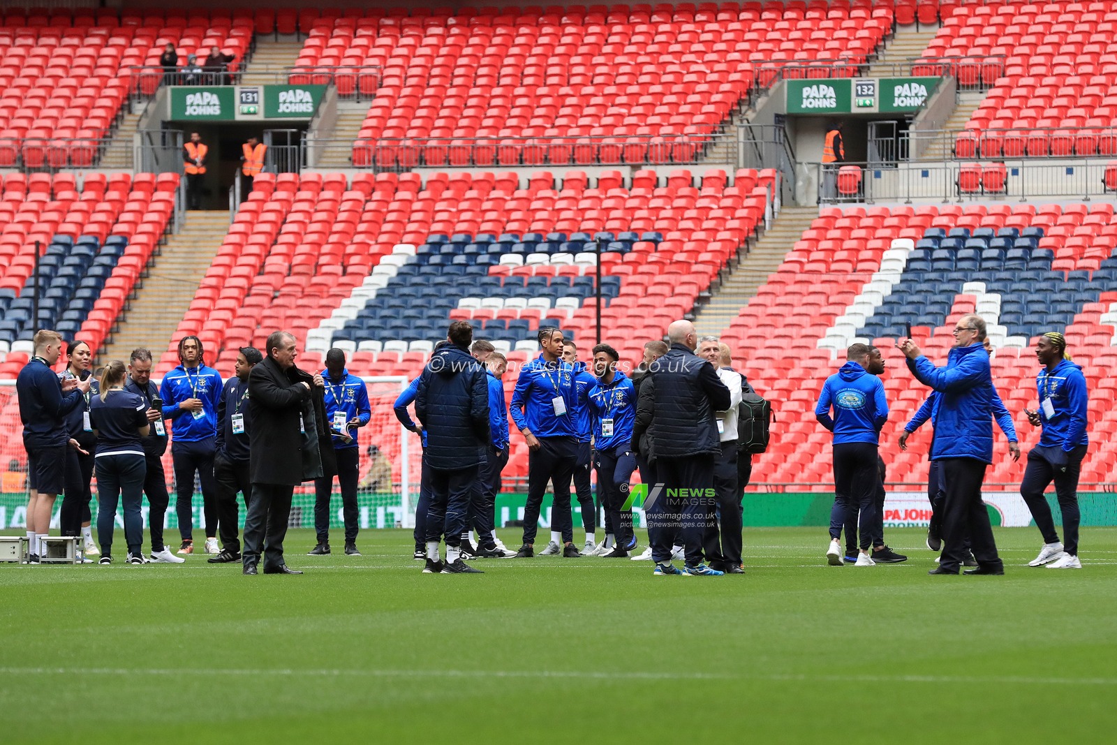 Sutton United players inspect their surroundings.