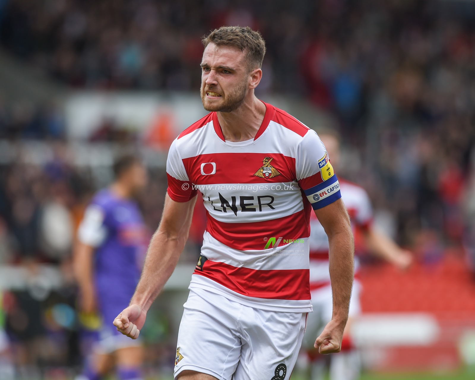 7th September 2019, Keepmoat Stadium, Doncaster, England; Sky Bet League One Football, Doncaster Rovers vs Rotherham United ; Ben Whiteman (8) of Doncaster Rovers celebrates scoring the winning penalty to give Rovers a 2-1 Win over local neighbours Rotherham United.

Credit: Dean Williams/News Images

English Football League images are subject to DataCo Licence