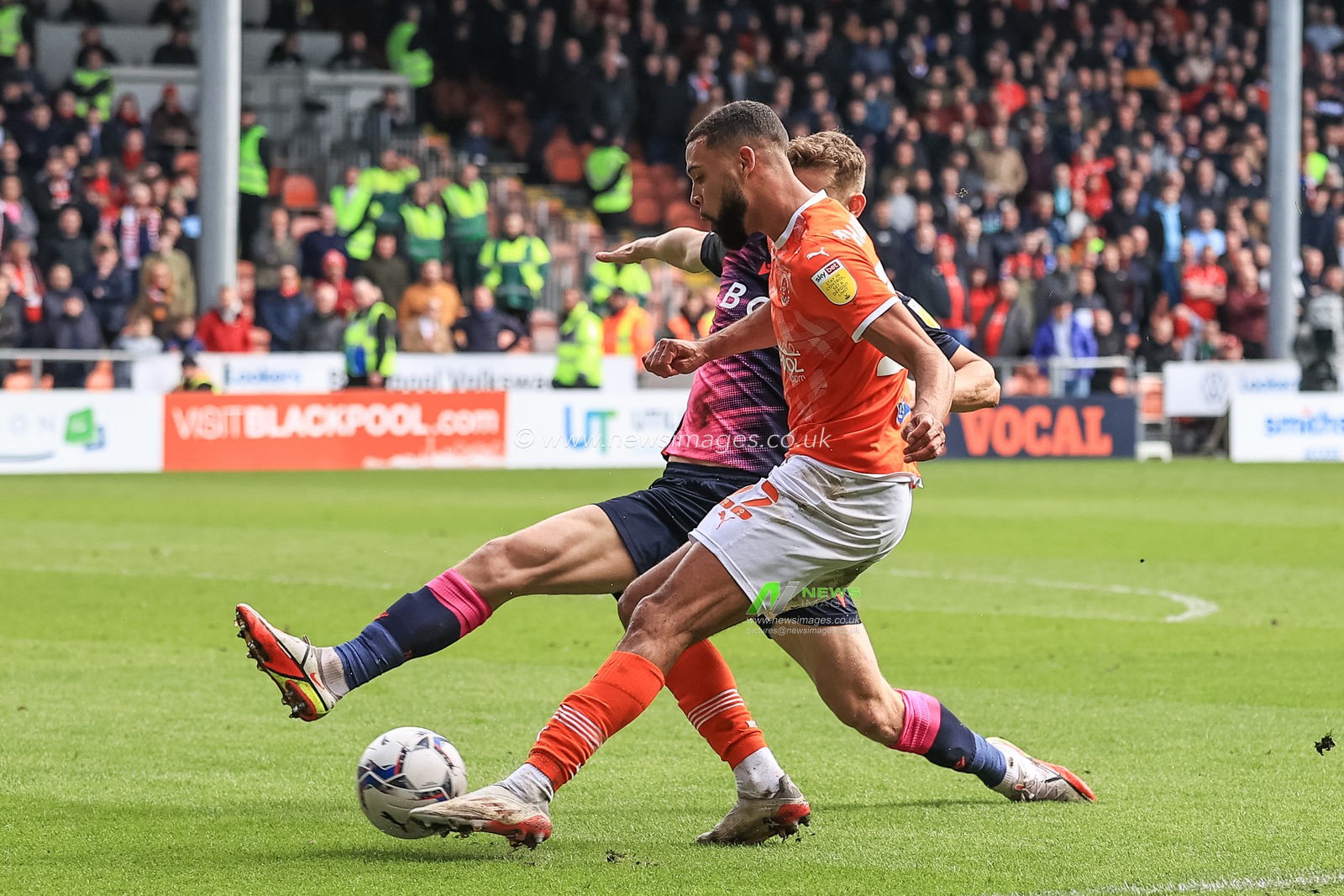 CJ Hamilton #22 of Blackpool crosses the ball