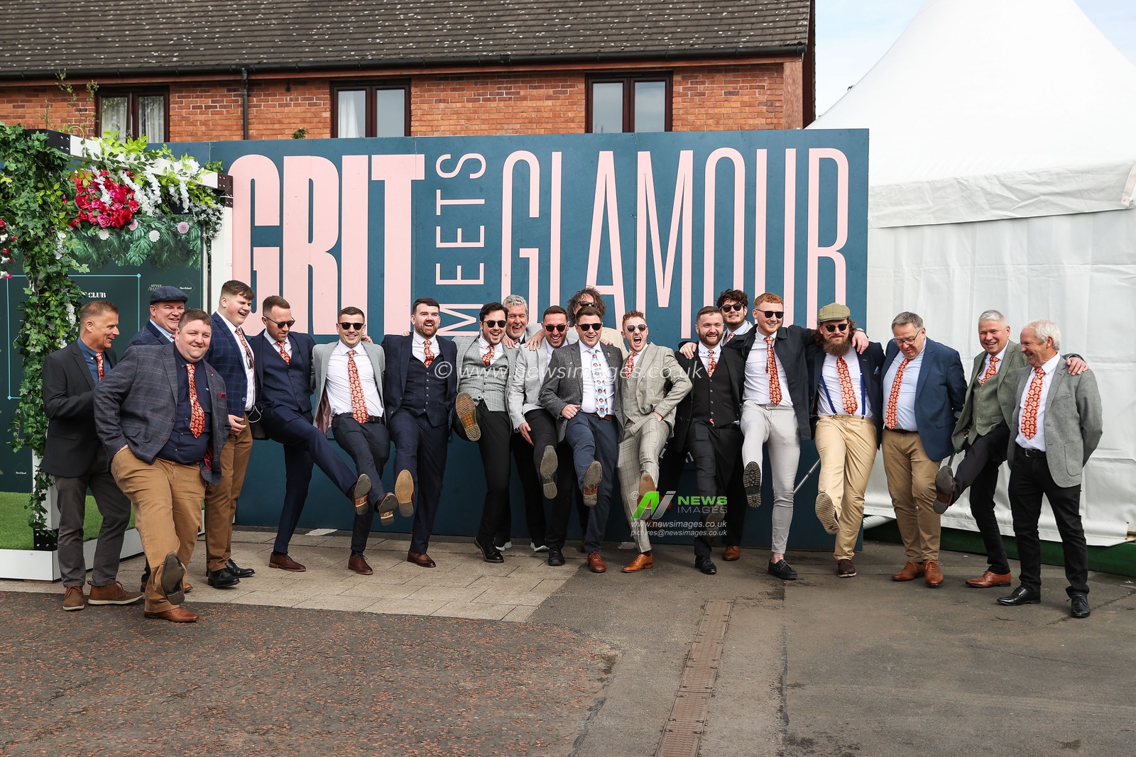 Racegoers arrive on ladies day during the The Randox Grand National 2024 Ladies Day at Aintree Racecourse, Liverpool, United Kingdom, 12th April 2024

(Photo by Mark Cosgrove/News Images)