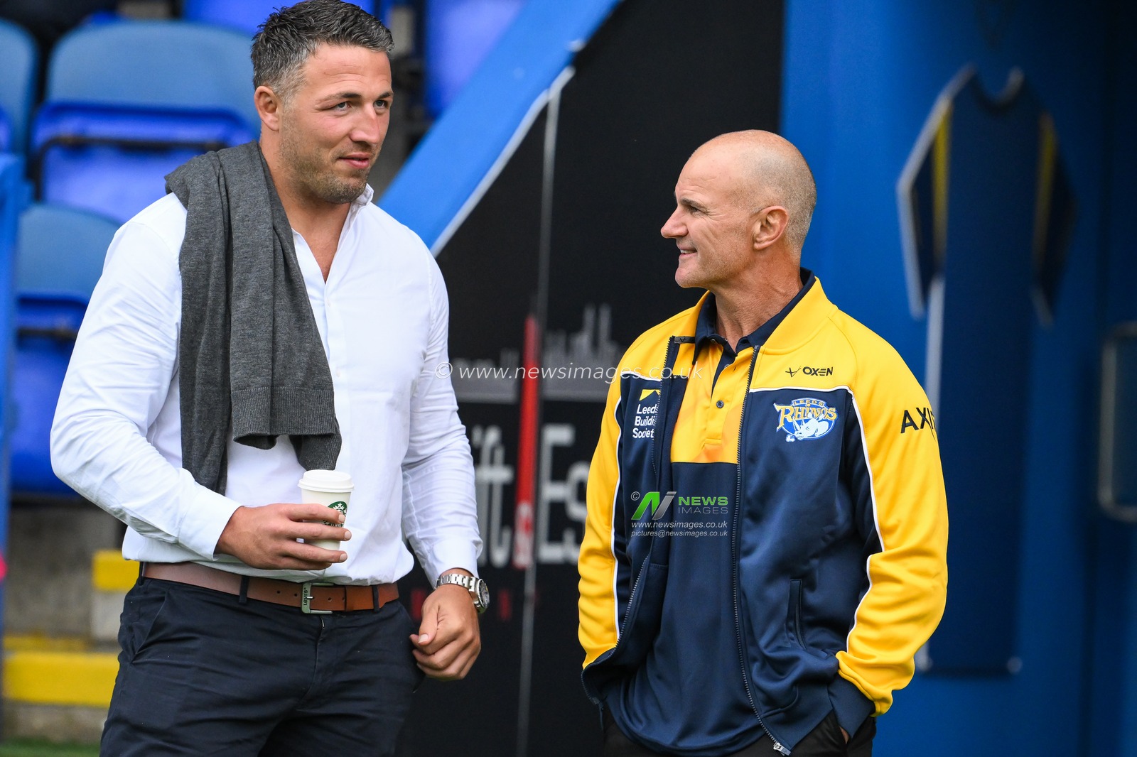 Sam Burgess Head Coach of Warrington Wolves chats to Brad Arthur Head Coach of Leeds Rhinos ahead of the Betfred Super League Round 17 match Warrington Wolves vs Leeds Rhinos at Halliwell Jones Stadium, Warrington, United Kingdom, 11th July 2024

(Photo by Craig Thomas/News Images)