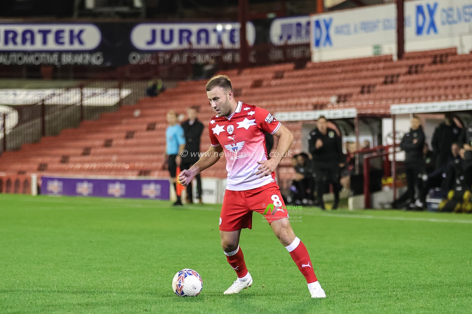 Herbie Kane #8 of Barnsley with the ball during the Emirates FA Cup 1st Round match Barnsley vs Horsham FC at Oakwell, Barnsley, United Kingdom, 3rd November 2023

(Photo by Mark Cosgrove/News Images)