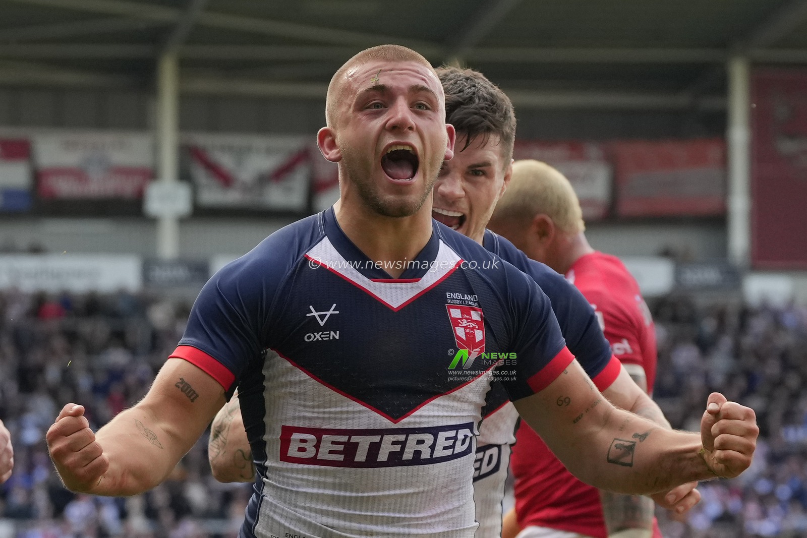 Mikey Lewis #6 of England celebrates his try during the Rugby League International match England vs Tonga at Totally Wicked Stadium, St Helens, United Kingdom, 22nd October 2023

(Photo by Steve Flynn/News Images)