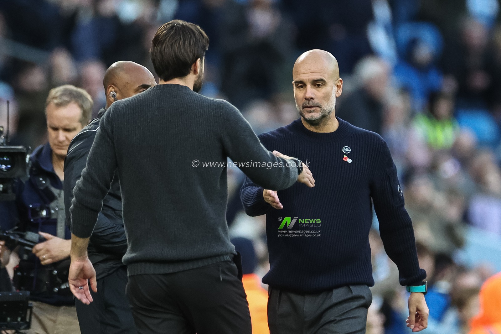 Pep Guardiola manager of Manchester City shakes hands with Russell Martin manager of Southampton after the final whistle during the Premier League match Manchester City vs Southampton at Etihad Stadium, Manchester, United Kingdom, 26th October 2024

(Photo by Mark Cosgrove/News Images)