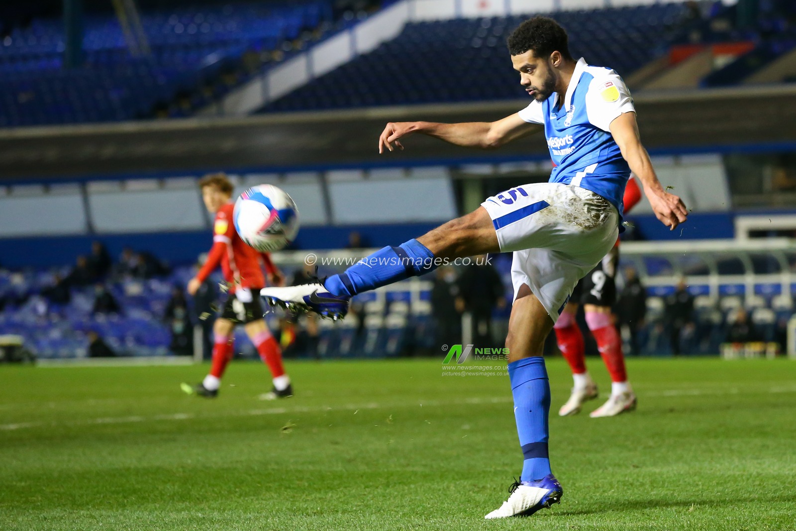 Jake Clarke-Salter #15 of Birmingham City clears the ball