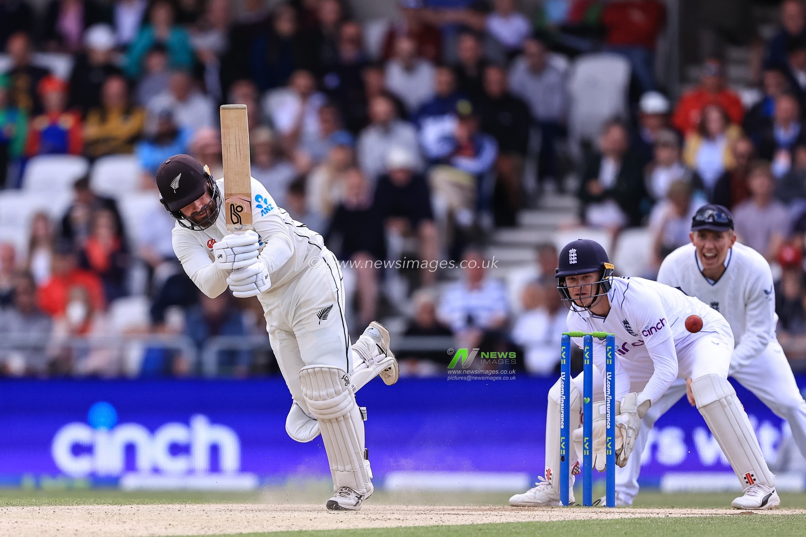 Tom Blundell of New Zealand hits two runs