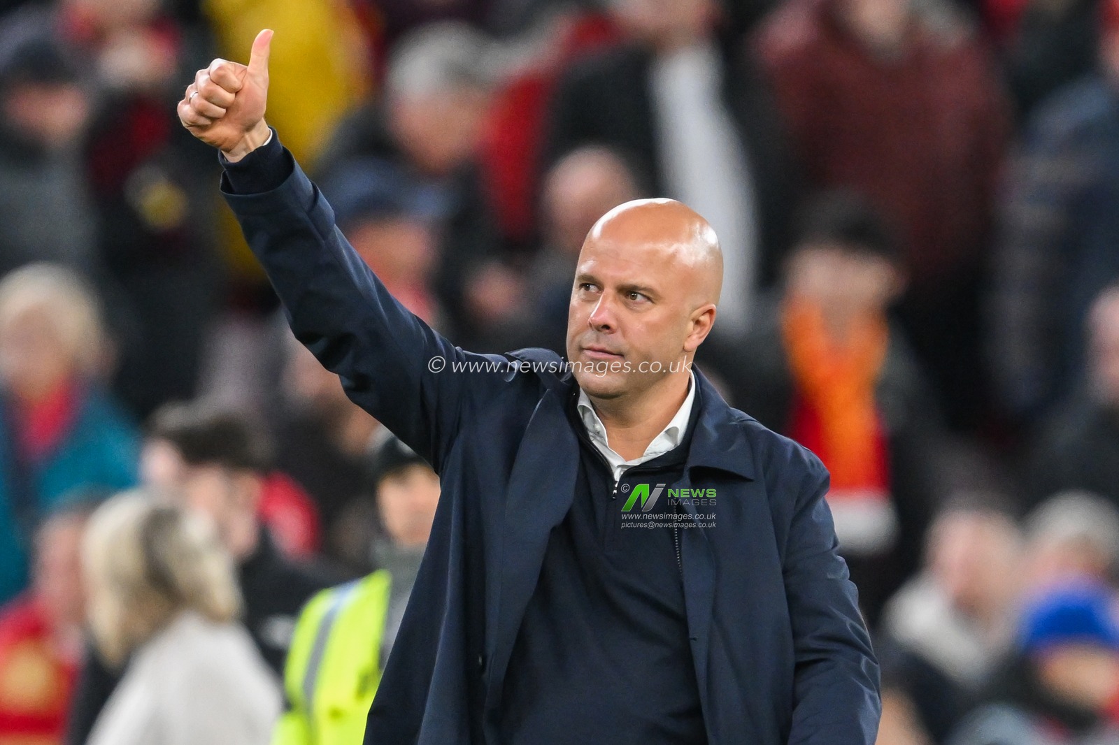 Arne Slot of Liverpool acknowledges the fans after the teams victory following the UEFA Champions League  - League Stage match Liverpool vs Bologna at Anfield, Liverpool, United Kingdom, 2nd October 2024

(Photo by Craig Thomas/News Images)