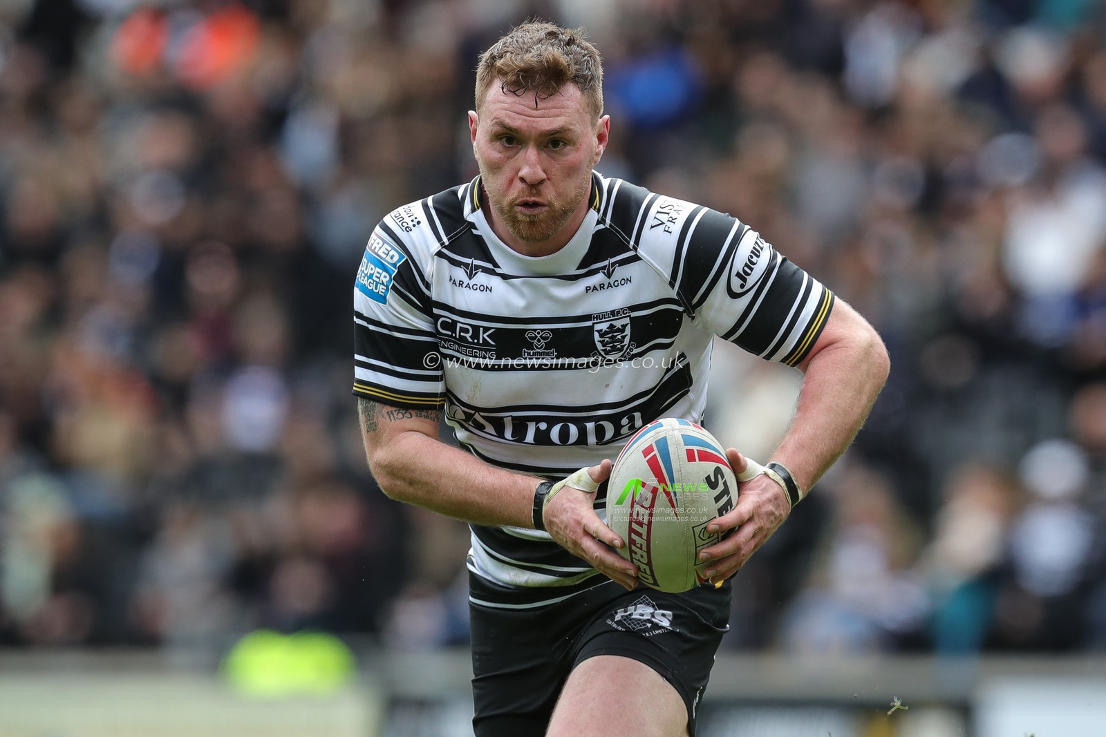 Scott Taylor #30 of Hull FC runs with the ball during the Betfred Super League Round 8 match Hull FC vs Hull KR at MKM Stadium, Hull, United Kingdom, 7th April 2023

(Photo by James Heaton/News Images)