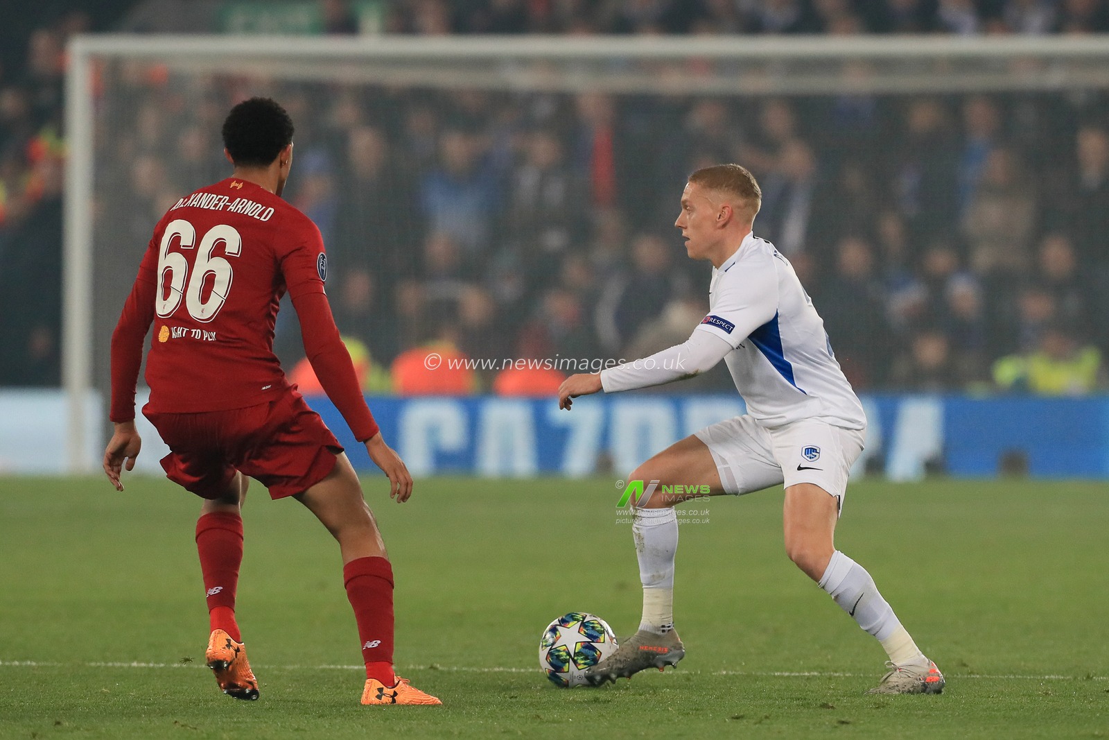 5th November 2019, Anfield, Liverpool, England; UEFA Champions League, Liverpool v KRC Genk : Casper de Norre (2) of KRC Genk with Trent Alexander-Arnold (66) of Liverpool looking to make a tackle

Credit: Mark Cosgrove/News Images