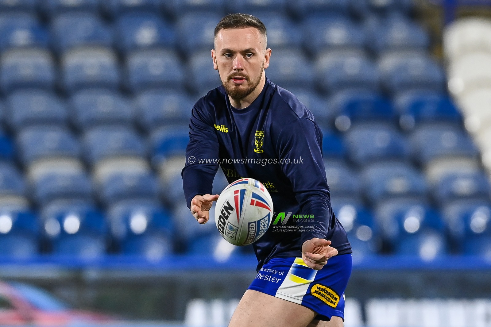 Ben Currie #11 of Warrington Wolves during pre match warm up ahead of the Betfred Super League Round 2 match Huddersfield Giants vs Warrington Wolves at John Smith's Stadium, Huddersfield, United Kingdom, 24th February 2023

(Photo by Craig Thomas/News Images)