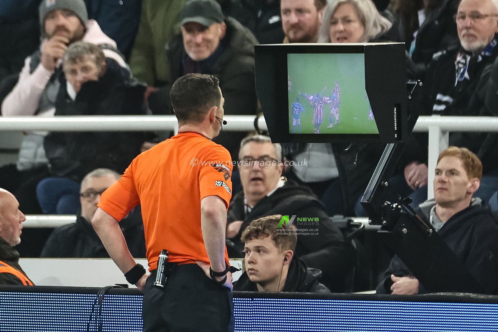 Referee Tony Harrington checks the VAR screen before awarding Everton a penalty during the Premier League match Newcastle United vs Everton at St. James's Park, Newcastle, United Kingdom, 2nd April 2024

(Photo by Mark Cosgrove/News Images)