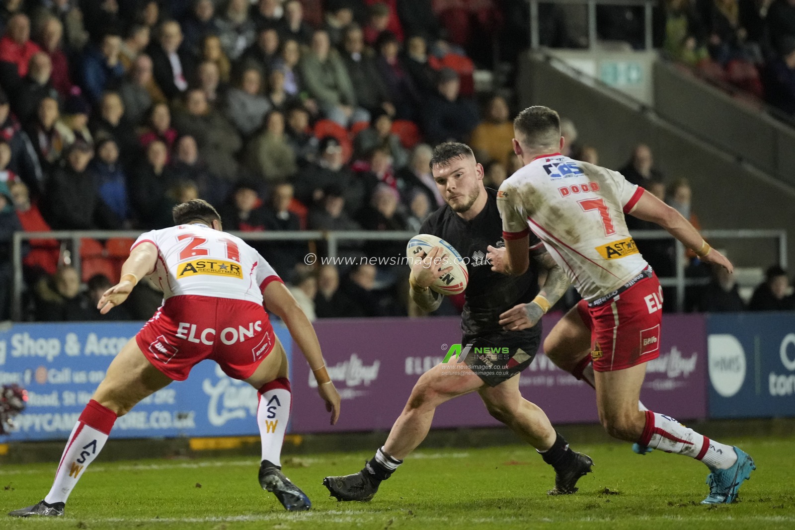 Robbie Storey of London Broncos runs at the St Helens defence during the Betfred Super League Round 1 match St Helens vs London Broncos at Totally Wicked Stadium, St Helens, United Kingdom, 16th February 2024

(Photo by Steve Flynn/News Images)