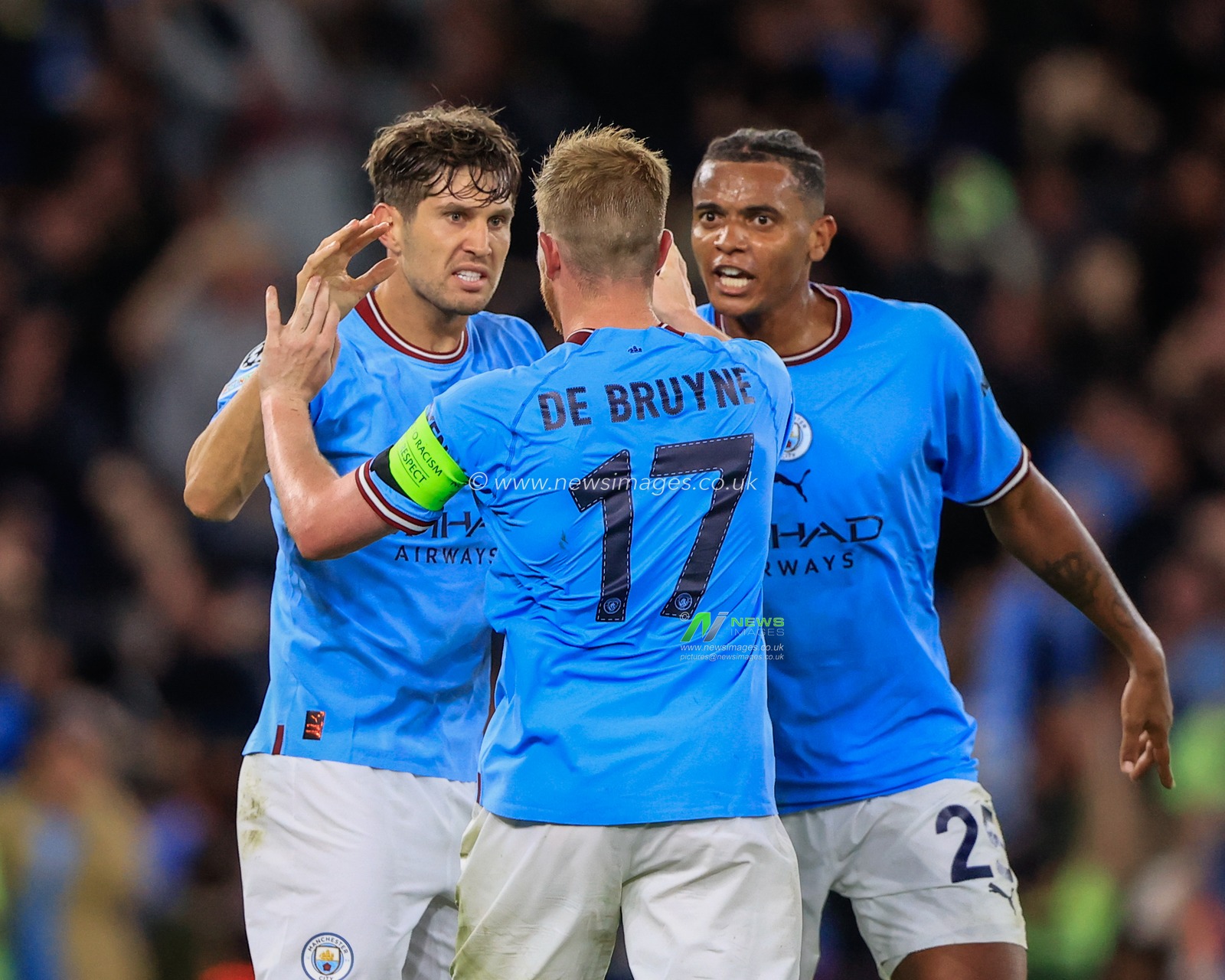 John Stones #5 of Manchester City celebrates his goal to make it 1-1 with Kevin De Bruyne #17 of Manchester City and Manuel Akanji #25 of Manchester City during the UEFA Champions League match Manchester City vs Borussia Dortmund at Etihad Stadium, Manchester, United Kingdom, 14th September 2022

(Photo by Conor Molloy/News Images)