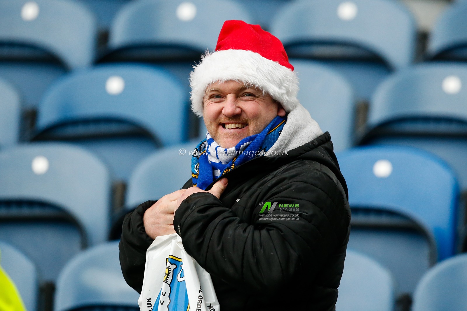 A fan of Sheffield Wednesday wears a festive santa hat during the Sky Bet League 1 match Sheffield Wednesday vs Oxford United at Hillsborough, Sheffield, United Kingdom, 17th December 2022

(Photo by Ben Early/News Images)