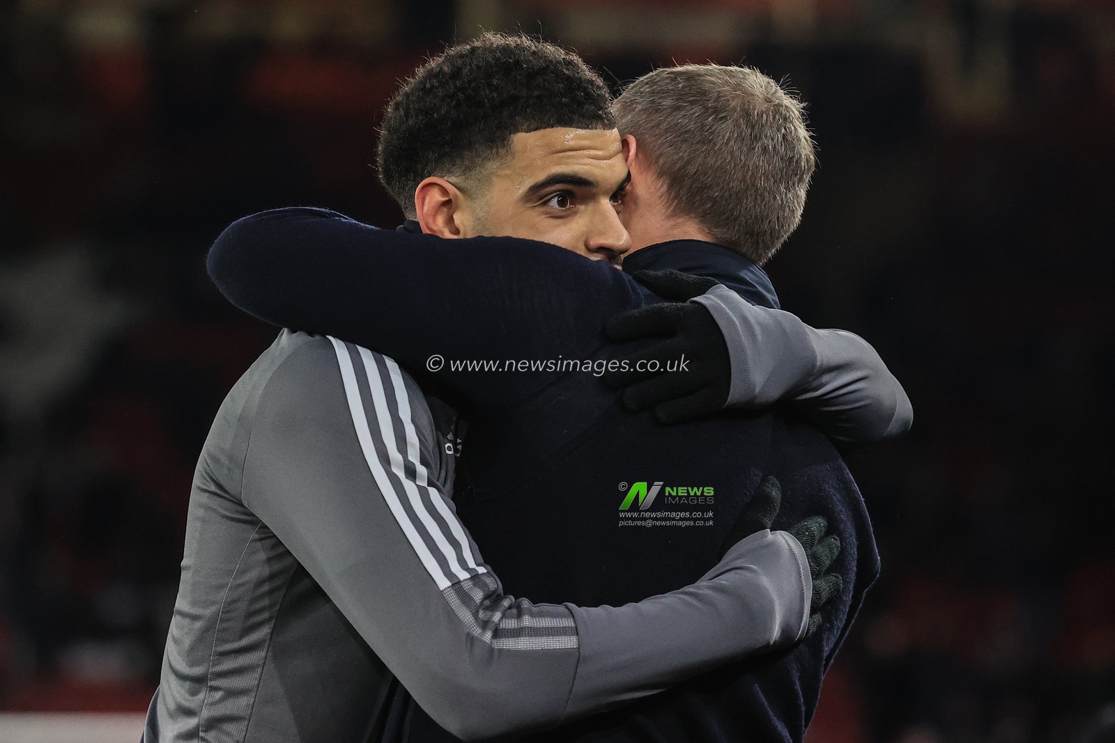 Morgan Gibbs-White #27 of Sheffield United embraces Steve Cooper manager of Nottingham Forest
