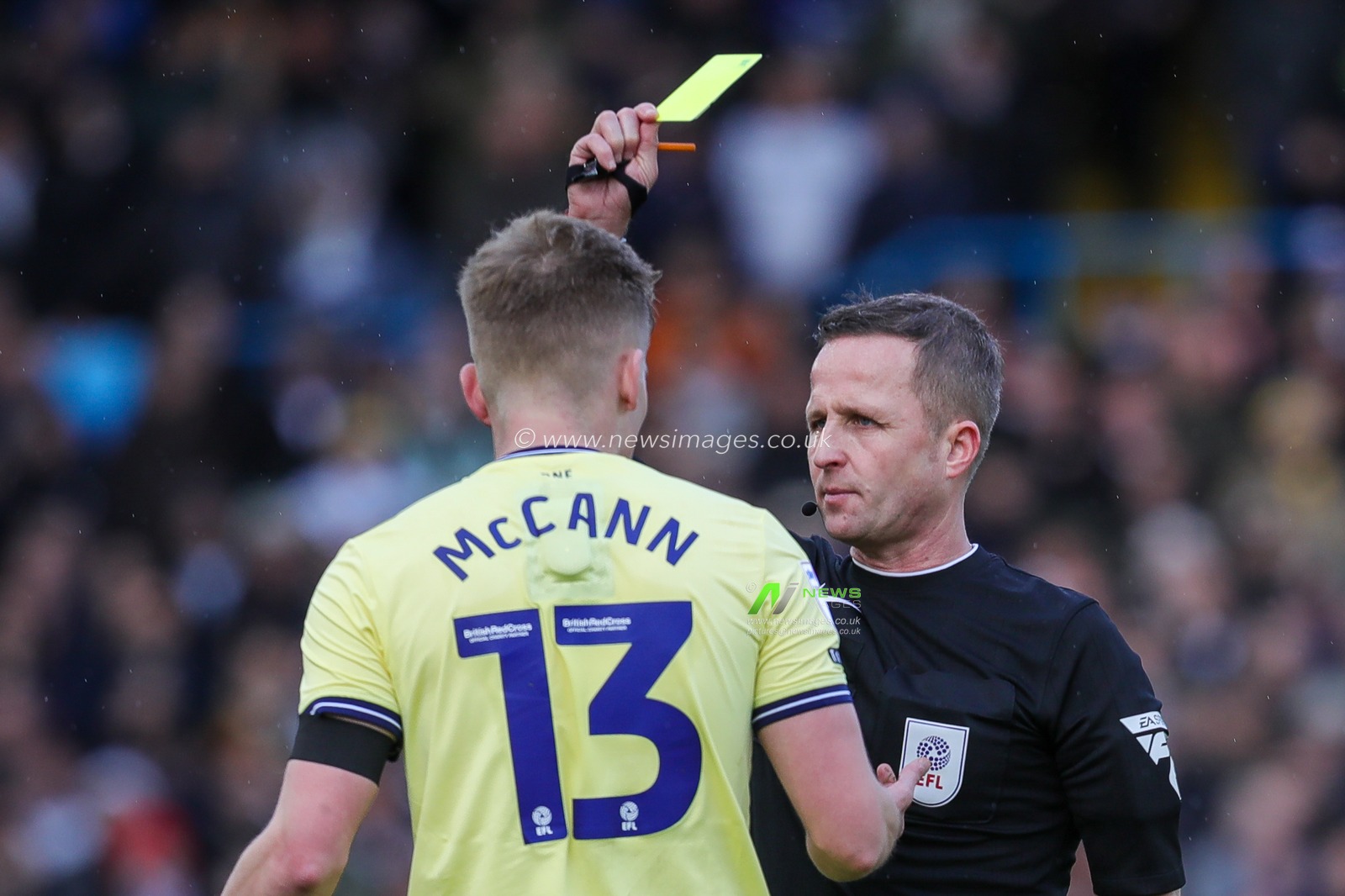 Referee David Webb awards a yellow card to Ali McCann during the Sky Bet Championship match Leeds United vs Preston North End at Elland Road, Leeds, United Kingdom, 21st January 2024

(Photo by James Heaton/News Images)