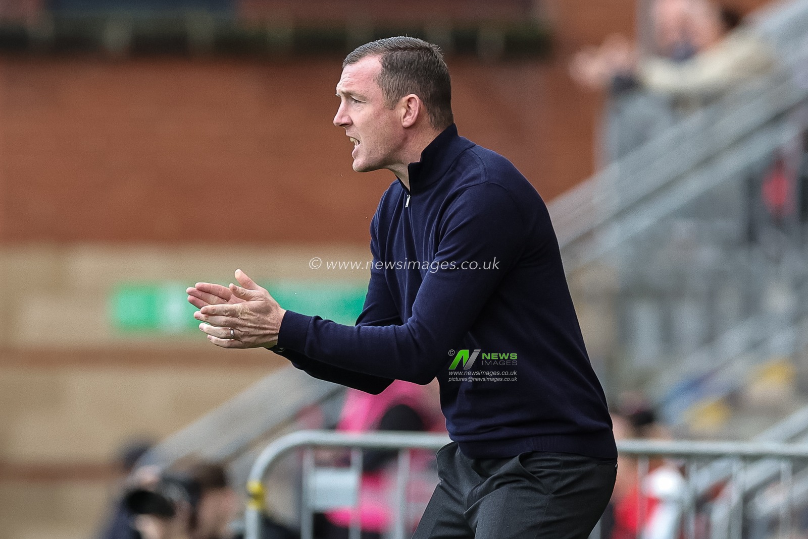 Neill Collins Head coach of Barnsley gives his team instructions  during the Sky Bet League 1 match Leyton Orient vs Barnsley at Matchroom Stadium, London, United Kingdom, 21st October 2023

(Photo by Mark Cosgrove/News Images)