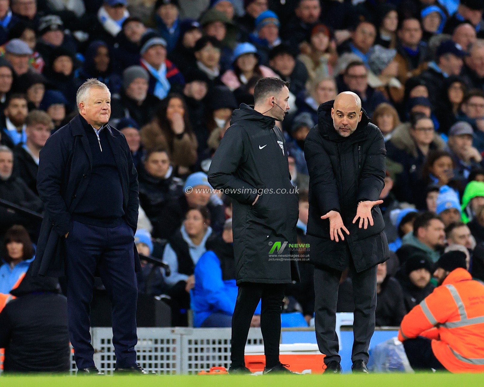 Pep Guardiola manager of Manchester City appeals to the fourth official Chris Kavanagh, during the Premier League match Manchester City vs Sheffield United at Etihad Stadium, Manchester, United Kingdom, 30th December 2023

(Photo by Conor Molloy/News Images)