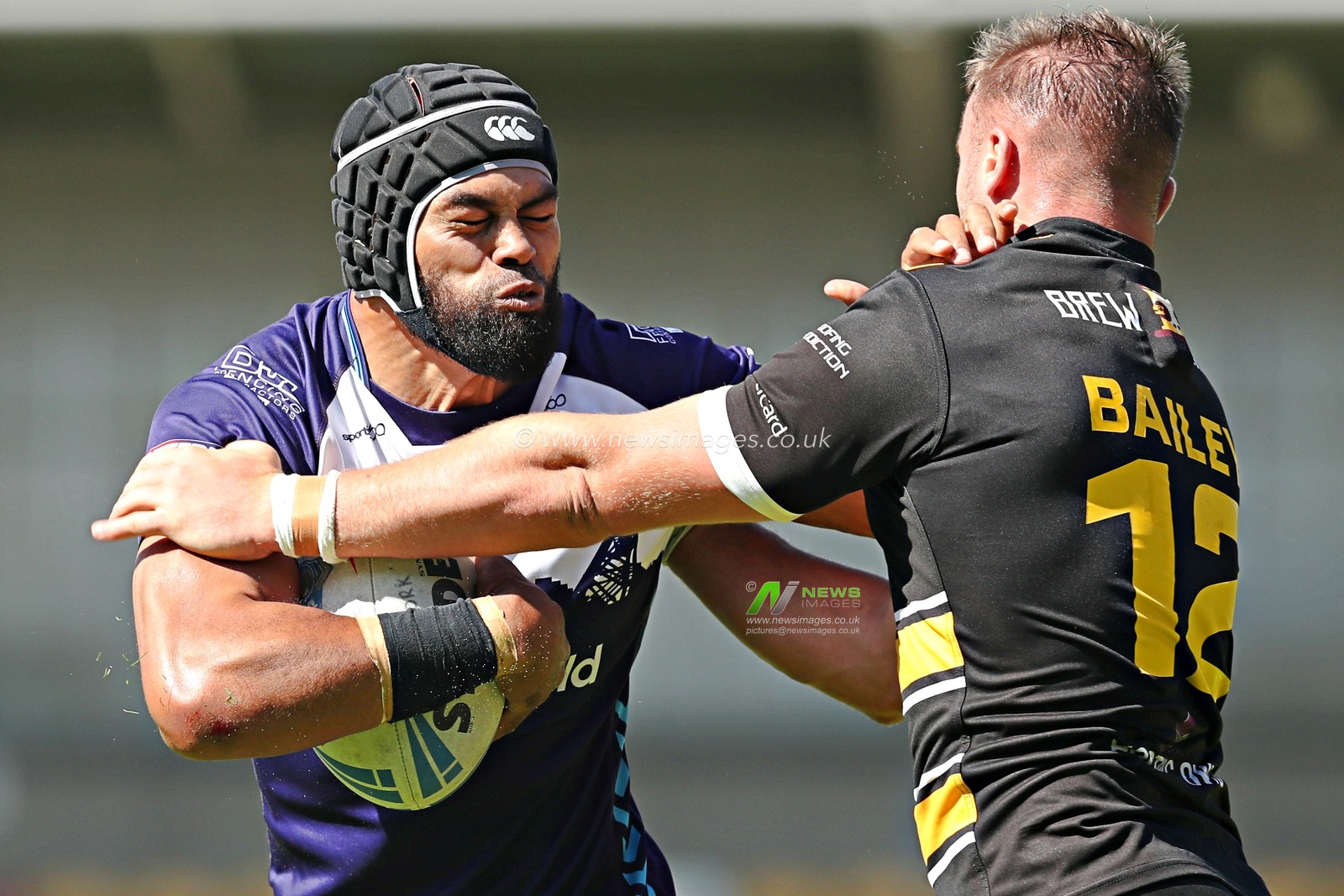 Connor Bailey of York Knights RLFC tackles Sitaleki Akauola of Featherstone Rovers during the Betfred Championship match York City Knights vs Featherstone Rovers at LNER Community Stadium, York, United Kingdom, 29th June 2025

(Photo by Sam Eaden/News Images)