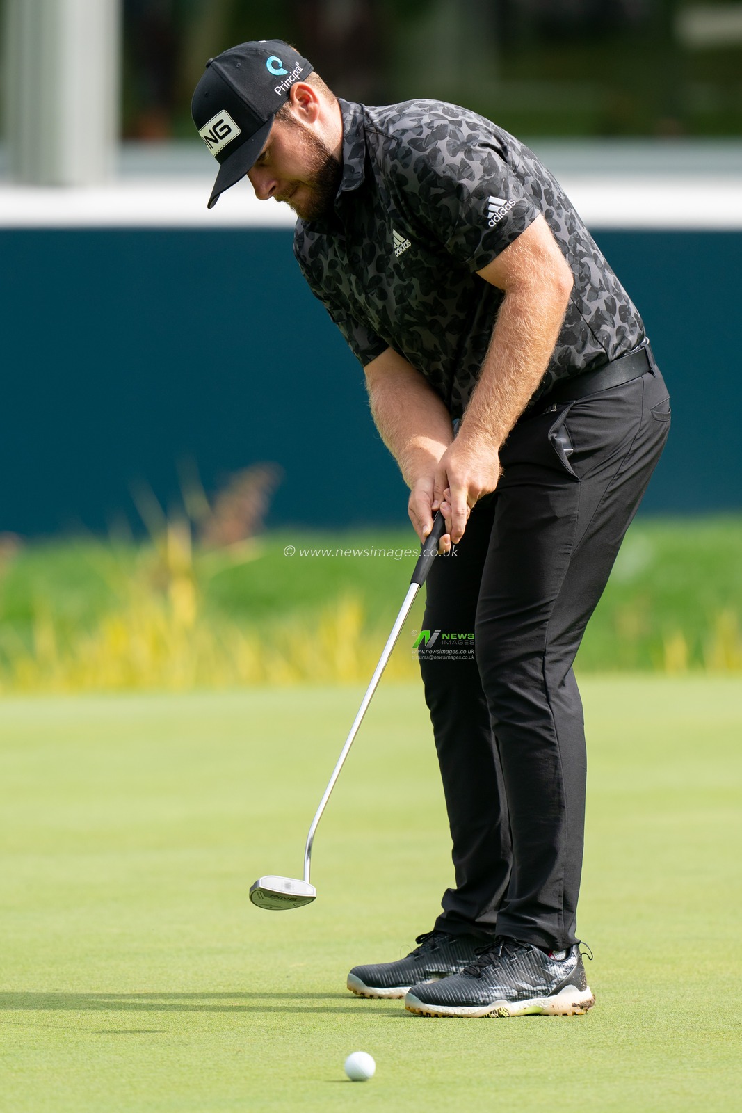 Tyrrell Hatton (ENG) lines up a putt on the 18th green during the BMW PGA Championship 2022 at Wentworth Club, Virginia Water, United Kingdom, 10th September 2022

(Photo by Richard Washbrooke/News Images)