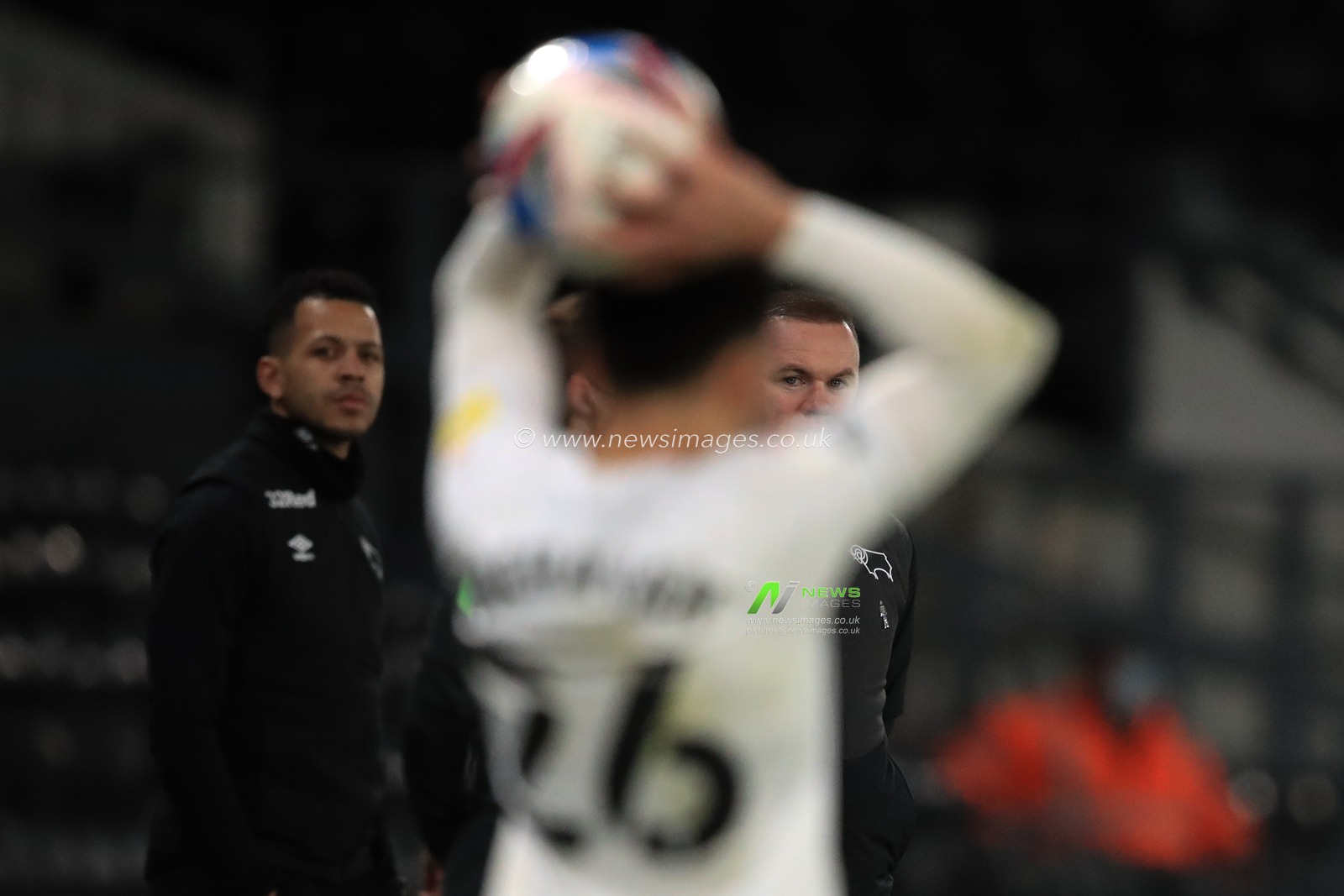 Wayne Rooney manager of Derby County watches Lee Buchanan #26 of Derby County take a throw-in