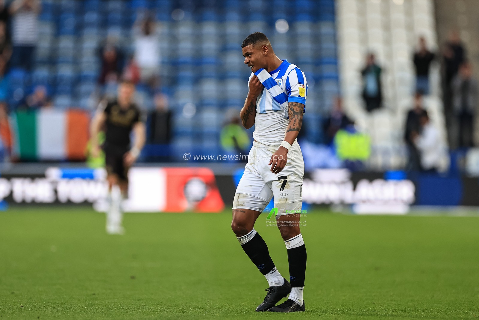 Tino Anjorin #7 of Huddersfield Town reacts after the final whistle