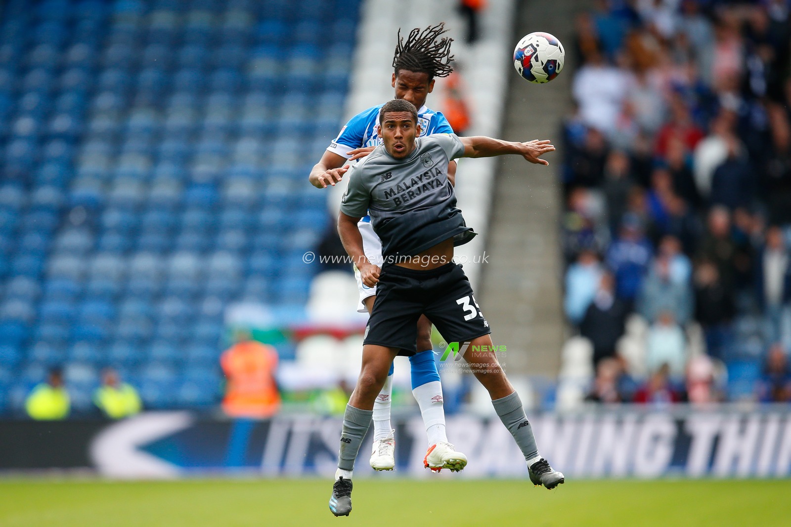 Etienne Camara #24 of Huddersfield Town and Andy Rinomhota #35 of Cardiff City during the Sky Bet Championship match Huddersfield Town vs Cardiff City at John Smith's Stadium, Huddersfield, United Kingdom, 17th September 2022

(Photo by Ben Early/News Images)