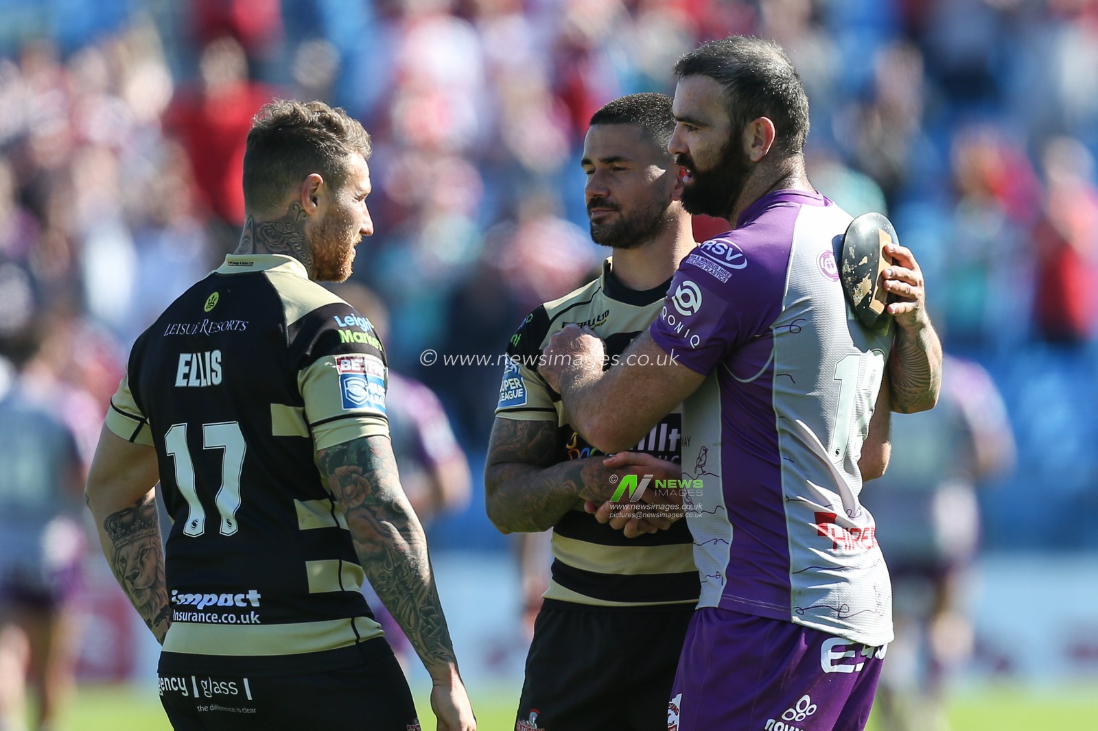 Kane Linnett (12) of Hull KR speaks to Jamie Ellis (17) of Leigh Centurions after the final whistle