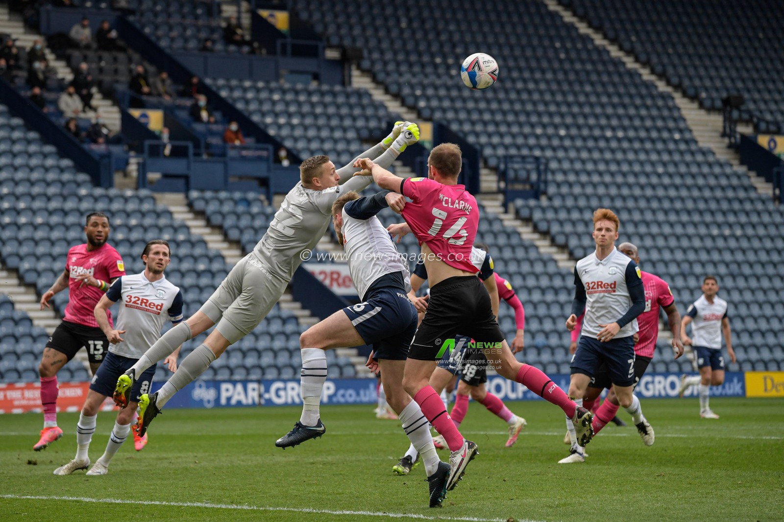 Daniel Iversen #22 of Preston North End punches the ball clear