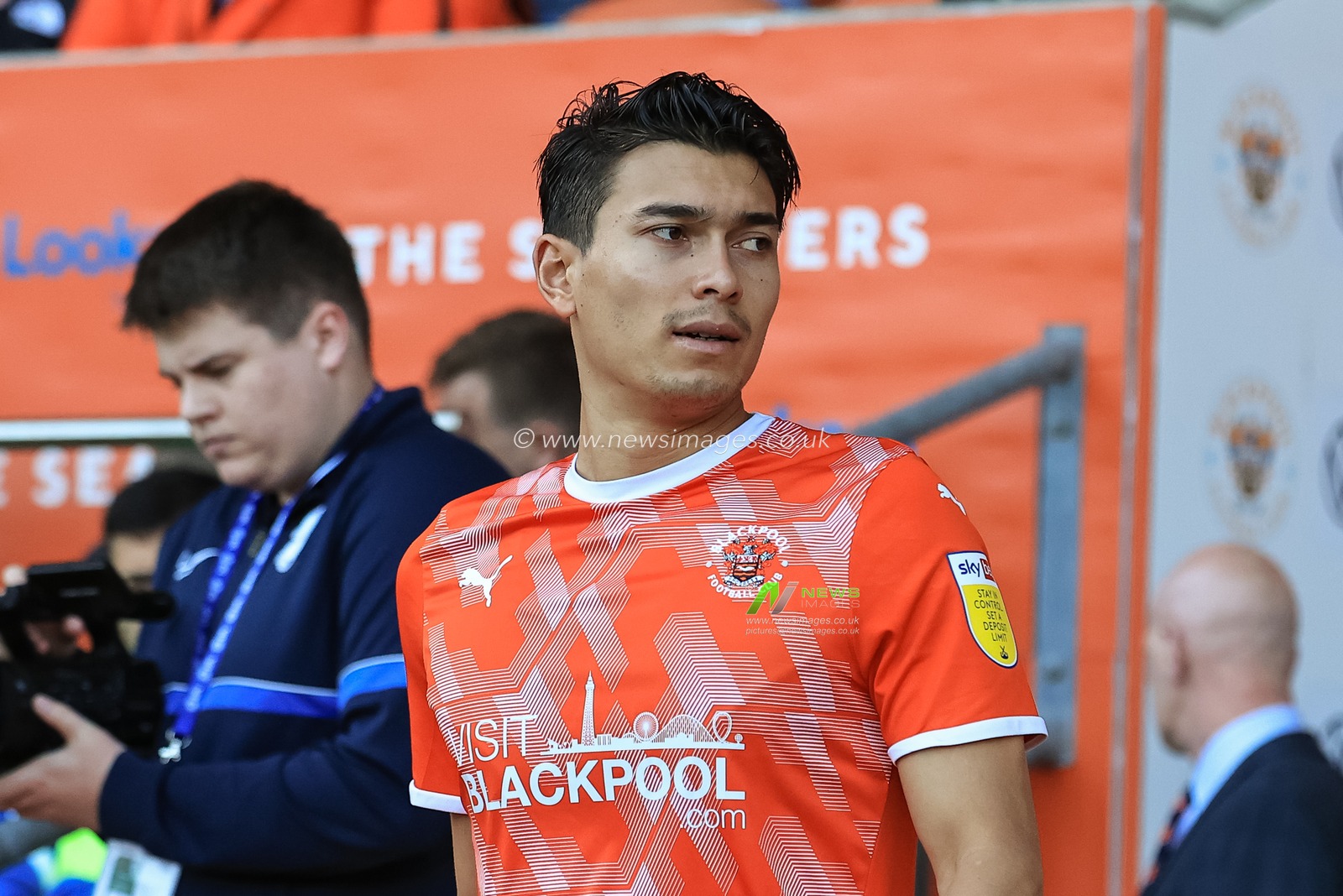 Kenny Dougall #12 of Blackpool walks out for kick-off
