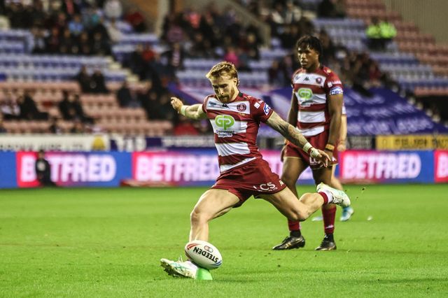 Adam Keighran of Wigan Warriors scores a penalty during the Betfred Super League Semi Final 1 match Wigan Warriors vs Leigh Leopards at The Brick Community Stadium, Wigan, United Kingdom, 3rd October 2025

(Photo by Alfie Cosgrove/News Images)