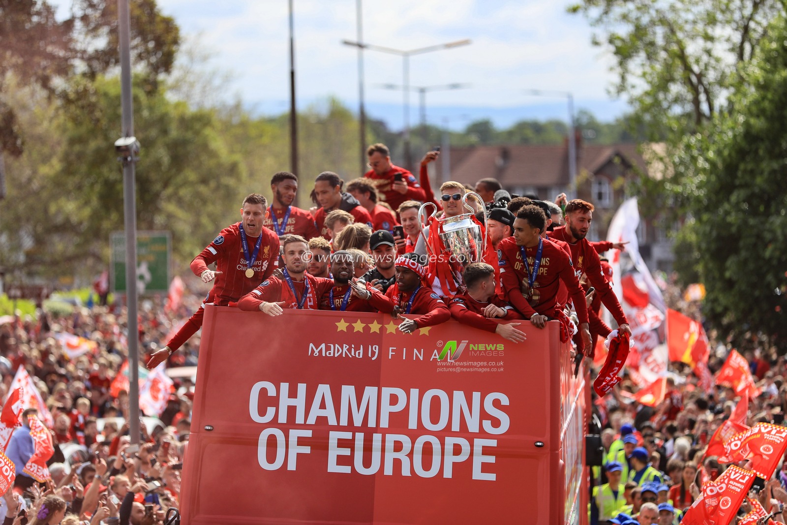2nd June 2019 , Liverpool, England; UEFA Champions League, Liverpool FC Champions League winners celebrations and open top bus parade ; Liverpool players celebrate with the fans on their open top bus as it tours the City


Credit: Mark Cosgrove/News Images