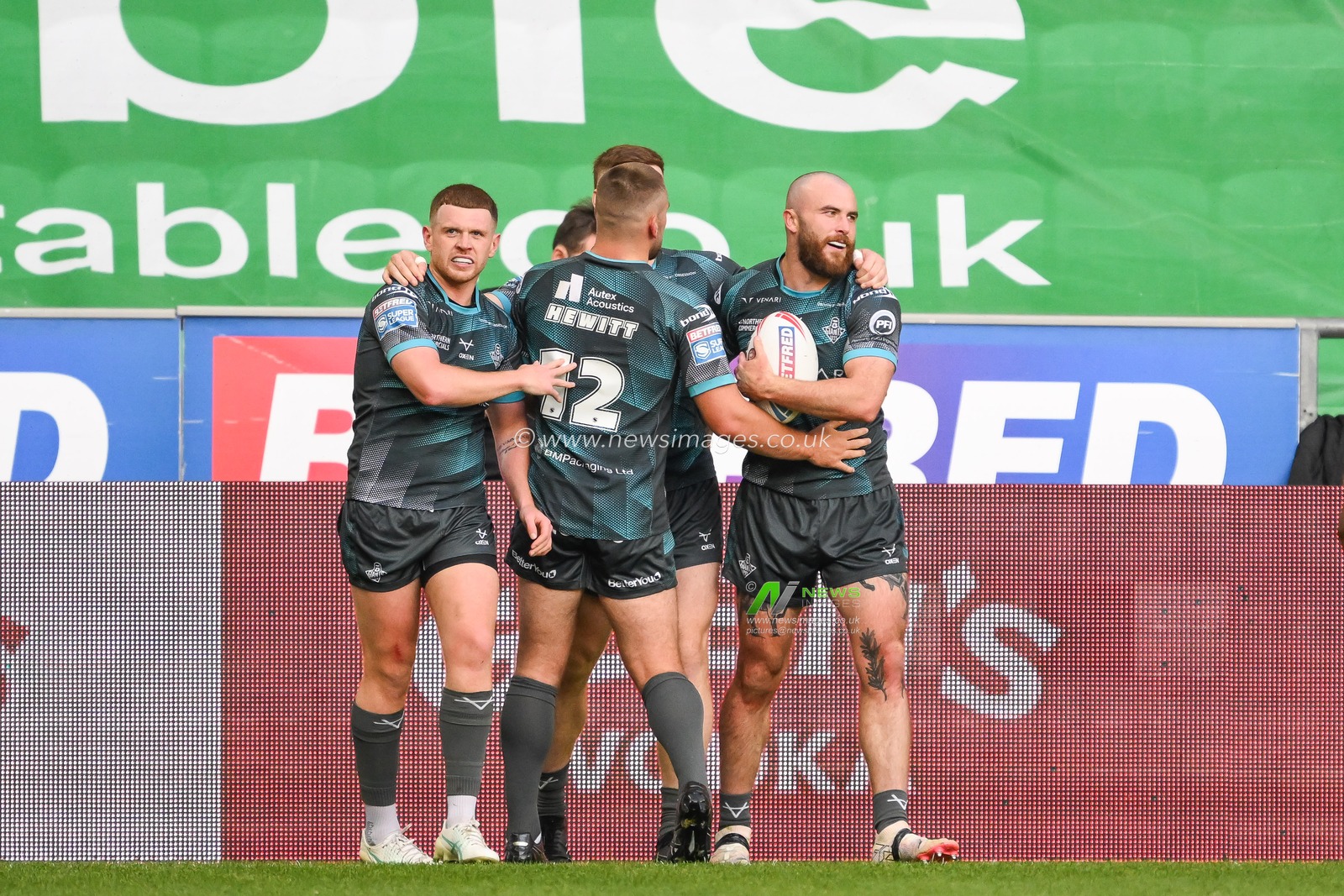 Liam Marshall of Wigan Warriors celebrates his try during the Betfred Super League Round 20 match Wigan Warriors vs Huddersfield Giants at DW Stadium, Wigan, United Kingdom, 1st August 2024

(Photo by Craig Thomas/News Images)